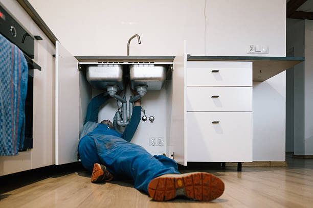 Professional Emergency Plumber technician working in Arlington, NY